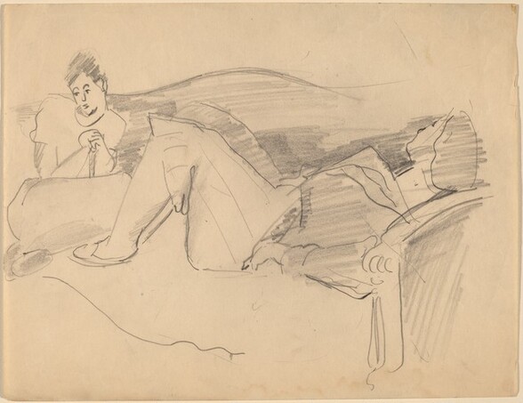 Two Women Lounging on Sofa