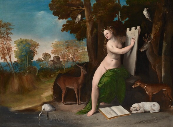 A pale, nearly nude young woman perches on a rock under a tree surrounded by small animals including dogs, deer, and birds, in this horizontal landscape painting. Her body faces us as, lips parted, she looks away to our left. She is covered only by an olive-green drape over her left thigh, on our right. She cradles what appears to be a tall stone tablet in her left arm and touches the inscribed surface with her right hand. White, buttercup-yellow, and crimson-red flowers crown her long blond hair. Her smooth pink skin stands out against the brown bark of the tree trunk behind her. By her right knee, a small brown doe stands looking at her. Closer to us, a white, wading bird dips its beak into a pool of water in the lower right corner of the painting. A large book of diagrams lies open next to the woman's foot, on the slate-gray ground. A small, white dog crouches next to the book on our right in front of a sleek, brown dog and a buck with antlers, and all face the woman in profile. In the trees above, a white hawk perches near the upper right corner of the canvas, and an owl sits on a branch over the woman’s head. Beyond the woman to our left, a steep bank is topped by wispy trees and shrubs. A sandy path meanders past the bank toward a wooden building in the distance. Delicate trees with rust-red and gold canopies frame the building, while a topaz-blue haze behind it suggests a forest beyond. Full, gray clouds fill the sky overhead above a band of pale light on the horizon.
