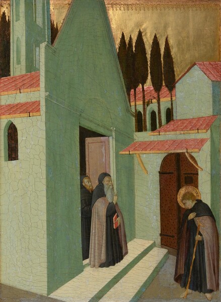 Three pale-skinned men wearing long, dark robes stand in and near a dense cluster of vivid, mint-green buildings with arched openings and clay-red colored roofs that nearly fill this vertical painting. Near the lower center of the composition, two bearded men stand in an open doorway looking out at the younger, cleanshaven man who stands barefoot to our right, facing them. At the door, the man in front has a long, white beard, and he holds a red book, or manuscript, in his left hand while holding up his right hand with his first two fingers raised. The man behind him has a red beard and hair. The younger man to our right bows his head, encircled with a gold halo, toward the pair in the doorway. The younger man holds one hand over his heart, and in the other holds a long, gnarled walking stick. The skin of all three men has a greenish cast. The green buildings are tall and narrow. Beyond the buildings, near the top of the panel, a row of tall, dark green trees are silhouetted against the shiny gold sky. The gold background is punched with a decorative band of small circles and arches along the top edge of the panel.