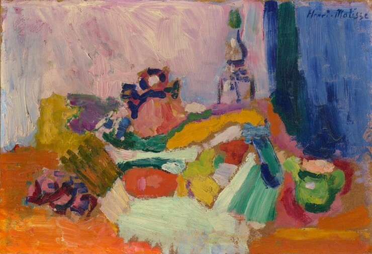 This abstract, horizontal painting is created with broad, visible strokes in areas of saffron orange, harvest yellow, carnation pink, violet, tomato red, cobalt and ultramarine blue, and shades of icy, seafoam, and pine green. Many of the colors are layered like strata in a canyon. A few objects are more recognizable, like a loosely painted pink kettle with royal-blue highlights at the back next to a bottle outlined with blue against the background. A spring-green teapot with a peach lid is to our right. The surface, presumably the table, is painted in tones of marigold and pumpkin orange. The left two-thirds of the background is painted with strokes of lavender-blue and mauve-pink streaked with cream white. The rightmost third is lapis blue. The artist signed the painting in the upper right corner, “Henri Matisse.”