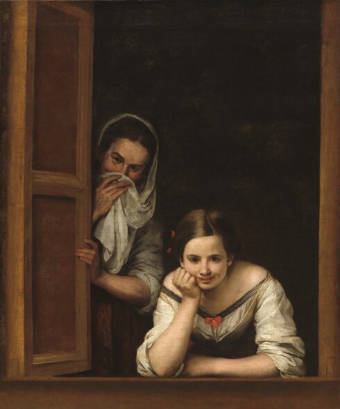 Two women with pale skin look out at us from the other side of a rectangular window opening with a shadowy interior behind them in this vertical painting. On our right, in the lower third of the composition, one young woman leans toward us over her left arm, which rests along the window ledge. She bends her right arm and props her chin on her fist. She looks at us with dark brown eyes under dark brows. She has shiny chestnut-brown hair with a strawberry-red bow on the right side of her head, to our left. She has a straight nose, and her full pink lips curve up in a smile. She wears a gossamer-white dress with a wide neckline trimmed in dark gray, with another red bow on the front of her chest. Her voluminous sleeves are pushed back to her elbows. To our left, a second woman peeks around a partially opened shutter. She is slightly older, and she stands next to the first woman with her body facing us. She tilts her head and also gazes at us with dark eyes under dark brown brows. She has dark brown hair covered by an oyster-white shawl. She holds the shawl up with her right hand to cover the bottom half of her face. Her mouth is hidden but her eyes crinkle as if in a smile. Her left arm bends at the elbow as she grasps the open shutter. She also wears a white shirt pushed back to her elbows, and a rose-pink skirt. The frame of the window runs parallel to the sides and bottom of the canvas. The room behind them is black in shadow.