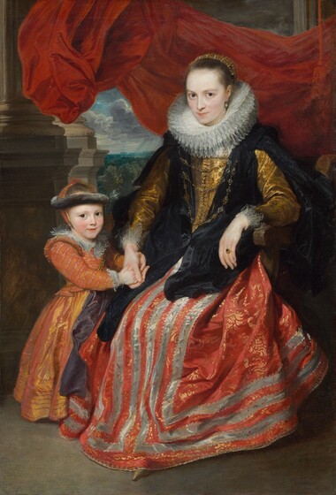 A young girl stands next to and holds the hand of an elegantly dressed woman sitting in a wooden armchair near stone columns, in front of a crimson-red curtain pulled up to reveal a distant landscape view in this vertical portrait painting. The child and woman have smooth, light skin, and the fabric of their dresses has a silken sheen. To our right, the woman sits with her knees angled slightly to our left, and she looks at us with dark blue eyes under faint brows. Her brown hair is pulled back from her high forehead under a hair covering set with pearls. Her pointed chin is slightly pulled back, and her pale pink lips are closed. A teardrop-shaped pearl hangs from the ear we can see, and she wears two strands of pearls like a choker, above a thick, pleated lace ruff. The fabric of the long-sleeved bodice has a gold-on-gold pattern, and is lined with a row of buttons down the front. Filmy lace cuffs extend back over her forearms from her wrists. Her full, floor-length skirt is scarlet red with a gold, brocade-like pattern, and has silvery-gray stripes down the front and around the lower hem. The cloak she wears over the dress has a black-on-black floral pattern. Three thick gold chains hang across her bodice, and she wears a square-cut, gray stone set in a gold ring on the third finger of her left hand. To our left, the young girl stands next to the wooden arm of the chair and holds the woman’s hands with both of hers. The child looks at us with gray eyes, and her pale pink lips are parted in a slight smile. Her light brown hair is pulled back under a gray band, perhaps of fur, around her head, over an apricot-colored head covering that matches her dress. The tight-fitting, long-sleeved bodice is striped with bands of alternating gold and pink geometric designs against the apricot-peach background. A lace-edged collar lies across her shoulders. A red, oval pendant hangs from her three-standed pearl necklace, and she wears three pearl bracelets on one wrist. A thick gold chain falls across her chest and around one hip. The floor-length, full skirt has buttercup-yellow and shell-pink highlights on the coral-colored background. Behind the pair, the red curtain has been pulled up so it seems to flutter behind the woman’s head, in front of stone columns that frame a distant landscape view with trees. A blocky structure, presumably a building, sits on the far distant, hazy horizon. Light pours down in streaks from steel-gray clouds against a pale blue sky.