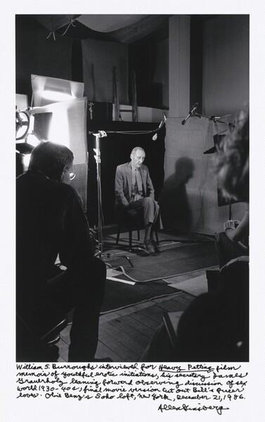 William S. Burroughs interviewed for Heavy Petting film memoir of youthful erotic initiations, his secretary James Grauerholz leaning forward observing discussion of sex world 1930 – 40s, final movie version cut out Bill’s queer loves. Obie Benz’s Soho loft, New York, December 21, 1986.