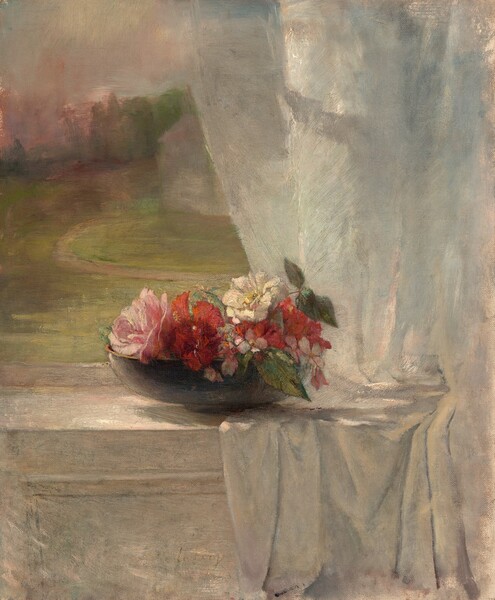 A sunlit bowl of pale and deep pink flowers sits on a white curtain draped over the sill of an open window in this vertical still life painting. The sill comes about a third of the way up the composition, and the open window and landscape beyond fills the top two-thirds. Shell-pink and ruby-red flowers with pine-green leaves fill the shallow, slate-gray bowl. Sunshine highlights one white flower and one blush-pink flower, perhaps roses. The white curtain falls over the right half of the window and pools on the sill before draping down and off the bottom edge of the composition. Sunlight dapples the curtain and the surface of the sill, and the paneling of the wall below the window is white. A tawny-brown path winds through a pale green lawn and around an ivory-colored house in the landscape seen through the window. The sky turns from silvery blue above to light mauve pink around trees lining the horizon in the distance.
