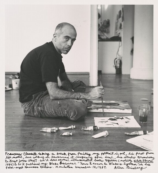 Francesco Clemente taking a break from painting my portrait in oil, his first from life model, here working on background of imaginary Afric head, his studio Broadway & Great Jones Street. We
