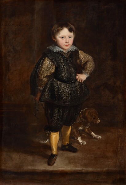 A young boy with pale skin and short brown hair, wearing a black and gold jerkin and breeches, white lace collar, and buttercup-yellow stockings, stands facing us with a dog at his heels in this vertical portrait painting. The boy is brightly lit so the area around and behind him are deep in shadow. His body is angled slightly to our right but he turns to look at us with green eyes under faint brows. He has a round face, a short nose, and the corners of his closed, coral-pink lips turn slightly up. His hair is parted in the middle and bangs sweep to each side of his forehead. He stands with his left fist resting on his hip so his elbow juts out. His other arm rests by his side and he holds the dog’s chain-link leash in that hand. The boy's right foot, on our left, points toward us. His close-fitting, belted jacket, breeches, and hip-length cape are embroidered with gold on black. He has a delicate lace collar at his neck, bright yellow stockings on his calves, and brown, round-toed shoes. The chain he holds connects to the collar on the brown and white dog, which could be a puppy. The dog’s collar is lined with large brass bosses like a row of buttons. The dog stands or sits with its front legs straight, and his back end is hidden by the boy’s legs. The background behind the boy is chestnut brown and the room seems to have a wooden floor. The painting is inscribed in black paint near the upper left corner: “Ao 1623 AET. 4. 7.”