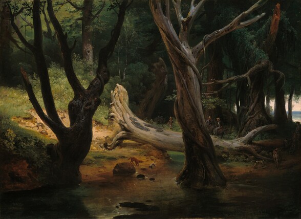 A shaft of sunlight illuminates a bone-white, barren tree trunk that has fallen across a stream within a dense wood in this horizontal landscape painting. The water closest to us is deep in shadow, and the surface closer to the opposite bank is a shimmering moss green. One spiraling, ash-brown tree trunk rises out of the stream to our right of center, and another hunched, gnarled trunk grows from the far bank, to our left. Tiny in scale, two dogs stand at the water’s edge between the gnarled tree and the fallen trunk beyond. The dirt earth where the tree had stood is sand-colored, and it is surrounded with pea and pine-green grass and growth. Nearly lost in shadow, to our right, three men gather just beyond the fallen tree. Two ride donkeys while the third strides toward them with his rifle resting on his shoulder, leading another donkey. All three men wear dark jackets and trousers and tan-colored hats. A fourth man rides a donkey into the scene from the right side. Just above his head, slivers of blue water and a pale pink sky peek through the tree trunks. A fifth donkey faces us from our side of the fallen tree and a third dog runs toward the water. The impenetrable forest reaches off the top edge of the painting, the trees painted in hunter, olive, and sage green. Many of the tree trunks are wrapped with vines.