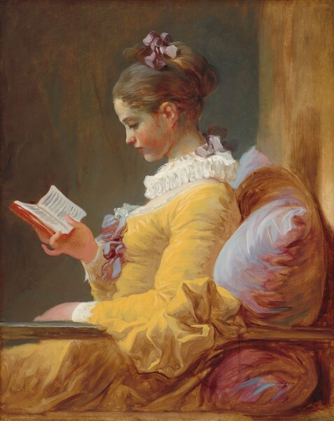 Seen from the lap up, a young woman with creamy white skin wearing a goldenrod-yellow dress sits reading a small book, facing our left in profile in this vertical painting. The deep, scooped neckline of her rich yellow gown is edged with lace and decorated with a mauve-colored bow at the bust. Her chest is covered by sheer white fabric under a ruffled, pleated collar. The ruff is tied at the back with a mauve bow, which is the same color as the bow that ties up her chestnut brown hair. She has a delicate nose and rosebud mouth, and she tips her head down to read the book she holds. She sits against an oversize pillow painted with pale lilac and deep rose-pink. Her left arm, closer to us, is draped over a railing that extends across the width of the canvas. The space behind her is indistinct. She sits before a teal-colored wall and a strip of light caramel brown to the right suggests another wall against which the pillow rests. The artist’s loose, lively brushstrokes are visible throughout.