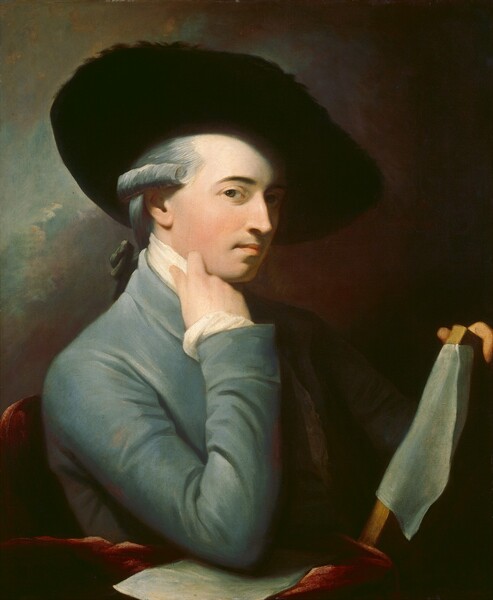 Shown from about the ribcage up, a cleanshaven man with pale skin sits with his elbow resting on the arm of his chair so the back of those fingers brush his chin in this vertical portrait painting. His body and face are angled to our right almost in profile so he looks at us from the corners of his brown eyes under dark, arched eyebrows. He has a straight nose, and his pale coral-pink lips are closed. His nickel-gray hair is curled along his ears and pulled back with an olive-green bow at the nape of his neck. His large hat is pushed back over his forehead, away from us, so its wide brim creates a dark circle around his face. The lapels of his steel-blue, tight-fitting jacket are folded back over a high, white collar. The edge of the white shirt also shows at the cuff of his right hand. The elbow closer to us rests on what might be a piece of light gray paper or piece of fabric, over a cranberry-red cloth or the arm of the upholstered chair. His left hand, farther from us, is propped on a wood frame or board, to which a small, white, square cloth appears to be affixed or draped. The light falls strongly from our upper left so his profile is brightly lit against the dark shadows on the far side of his face. The background darkens from light, slate blue to our left to coffee brown to our right.