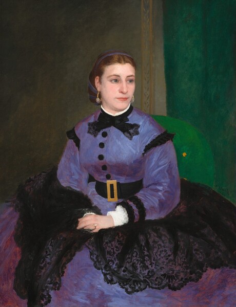 Shown from about the knees up, a woman with pale, pink skin and cinnamon-brown hair sits with her hands in her lap as she gazes off to our right in this vertical portrait painting. Her body is angled to our left but she looks in the other direction with round blue eyes. She has a straight nose and her wide, peach lips are closed in a soft line. Her hair is parted down the middle and tied back at the nape of her neck with a purple ribbon. She wears a long-sleeved, periwinkle-purple dress with black five black buttons down the front. Black lace lines her cuffs and her shoulders where the sleeves meet the bodice, and a black bow is tied around the high collar. She wears a wide black belt with a gold, rectangular buckle. A black lace shawl is wrapped around her waist and she holds it closed under her overlapping hands, which rest in her lap. Her full skirt spans the width of the canvas along the bottom edge. She wears gold hoop earrings with gray, oval stones at the front of each loop. On the hand we can see, she wears gold rings set with stones on her ring and pinky fingers. Her emerald-green chair has a rounded back. One vibrant yellow button is seen near her shoulder, and another is mostly covered by her skirt. The background behind her is stone gray to our left and shamrock green to our right. The portrait is loosely painted with visible brushstrokes, especially in the dress and background. The artist signed and dated the painting “A. RENOIR, 1865” along the edge of her skirt on the right side.
