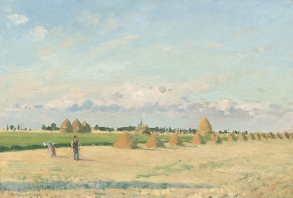 A man and woman stand in a sunny field near a line of cone-shaped haystacks under a massive blue sky in this horizontal landscape painting. The scene is loosely painted with visible brushstrokes throughout. A muted blue shadow cuts across the flax-yellow ground close to us from our left. About a dozen golden-brown haystacks extend from the center of the composition off into the distance to our right. The people stand in the harvested field to our left. Tiny in scale, the woman wears a rose-pink dress and white apron and cap. She bends over as the man stands nearby, resting a scythe against one shoulder. He wears a white shirt, a dark vest and cap, and blue pants. The field beyond is verdant green, with more haystacks in the distance. Dark green trees line the horizon, which comes about a third of the way up the painting. Lavender purple, blush-pink, and white clouds trundle across the ice-blue sky above. The artist signed and dated the painting in the lower left corner, “C. Pissarro, 1873.”