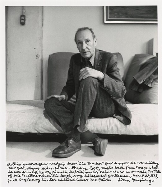 William Burroughs ready to leave the Bunker for supper, he was visiting New York staying in his former Bowery loft, maybe back from Europe where he was awarded rosette Chevalier des Arts, visible below the round American Institute of Arts & Letters pin on his lapel, very distinguished gentleman, March 26, 1985, just beginning his late additional career as a painter.