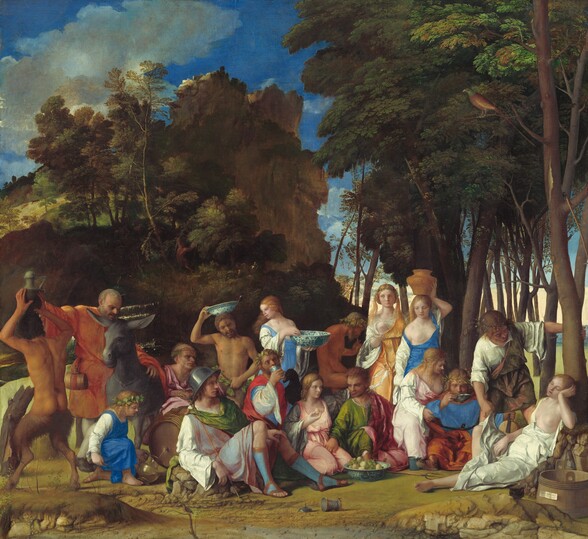 Six women, eight men, two satyrs, and one child gather in pairs and trios in a loose row that spans the width of this nearly square painting. They are set within a landscape with craggy rocks, cliffs, and trees. Most of the people face us, and the men, women, and child have pale skin while the two satyrs, who have men’s torsos and furry goat’s legs, have darker, olive complexions. Most of the men wear voluminous, knee-length togas wrapped in short robes in shades of white, topaz blue, grass green, coral orange, or rose pink. Most of the women wear long, dress-like garments in tones of shell pink, apricot orange, or lapis blue over white sleeves. For all but one woman, their garments have fallen off one shoulder to reveal a round, firm breast. Several objects are strewn on the rocky, dirt ground in front of the group, including a wide, wooden bucket with a piece of paper affixed to its front to our right, a glass goblet, a pitchfork, a large blue and white ceramic dish filled with grapes and small yellow fruits, and an overturned cup near the center. Cliff-like, craggy rocks rise suddenly behind the group to our left, filling much of the sky opposite a tall grove of leafy, dark green trees to our right. A few puffy white clouds float across the vivid blue sky. The slip of paper on the barrel has been inscribed, “joannes bellinus venetus p MDXIIII.”