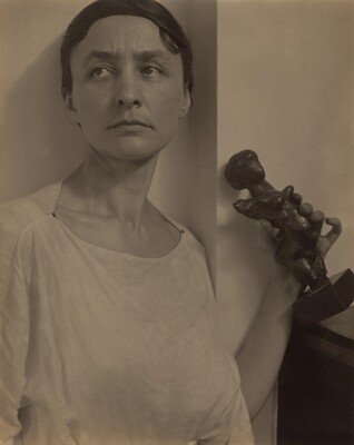 Georgia O'Keeffe with Matisse Sculpture