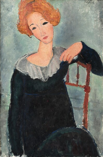 Shown from the lap up, a woman with peach-colored skin sits leaning sideways against the back of a wooden chair with her head tilted to our left on her long neck in this vertical, stylized portrait. The painting is done mostly with areas of mottled color outlined in delicate black lines. The top of her head and her left elbow, on our right, are slightly cut off by the edges of the canvas. Her copper-red hair is parted in the middle and puffs down and around her hears. Her elongated oval face and delicate features are simply drawn. Pencil-thin, nearly straight, grayish eyebrows float above almond-shaped eyes entirely filled in with black. A faint gray line forms her elongated nose. Her small rose pink, pursed lips are slightly darker than the faint blush on her cheeks. Her jet-black, long-sleeved dress has a high waist and a wide, diaphanous gray collar at the rounded neckline. Her left elbow, on our right, drapes over the top of the spindles making up the back of the chair so her hand rests near the gray collar. Her other arm rests by her side. The background is a foggy swirl of sage green and elephant gray. Two faint, thin, parallel, horizontal gray lines that run across the background may suggest a baseboard.