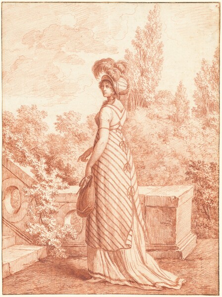 A Fashionable Woman Standing in a Park