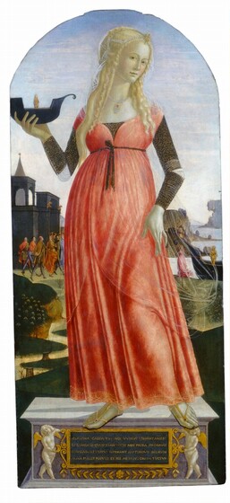 A young, pale-skinned woman with long, blond hair and wearing a coral-red gown stands on a pedestal before a landscape filled with people in this vertical painting. The painting has an arched top, and the woman who fills most of the view is Claudia Quinta. Her hair is adorned with strands of pearls, and a larger pearl hangs from a piece of jewelry like a brooch at the top center over her forehead. A sheer veil covers the back of her head. Her body faces us but she turns her head slightly to our right, so she gazes at us from the corners of her light hazel eyes. A pearl necklace with a square gold, sapphire-blue jewel and pearl pendant encircles her neck. The brown sleeves of her dress are flecked densely with short gold lines, and white fabric shows at gaps over the elbows. The red bodice has a high waist tied with a brown belt, which also holds sheer fabric in place so it falls to her knees over the long red skirt. The skirt is bordered with a gold geometric design along the bottom hem, which stops just short of her sandaled feet. In her right hand, on our left, she holds a small, navy-blue boat with a gold figure standing in it. Her other hand rests by her left thigh, to our right. She balances near the front edge of the rectangular pedestal, which is pale violet purple. On the front face, two winged, chubby children are painted white to resemble stone carvings. They brace a panel bordered in gold. The plaque has a teal-blue background, and gold letters read, “CLAVDIA CASTA FVI NEC VVLGVS CREDIDIT AMEN ET TAMEN ID QVOD ERAM TESTIS MIHI PRORA PROBAVIT CONSILIVM ET VIRTVS SVPERANT MATERQVE DEORVM ALMA PLACET POPVLO ET PER ME HVNC ORATA TVETVR.” Beyond Claudia Quinta a river winds in a tight S-curve through dark green hills. Farther back, to our left, a group of people with thin, elongated bodies dressed in blue, light brown, and orange walk in front of a tall dark blue building as they head toward a river on the right side. The building has an arched opening and a tower topped with a taupe-brown spire. To our right of Claudia Quinta, a woman wearing a rose-pink dress holds a rope around the prow of a boat at the edge of the river. Like the boat held by Claudia Quinta, it is navy blue and has the same shape. The pale lavender-purple river continues into the distance, where it meets rocky outcroppings along the horizon, which comes about halfway up the composition. A pale blue sky above is filled with wispy bands of clouds.
