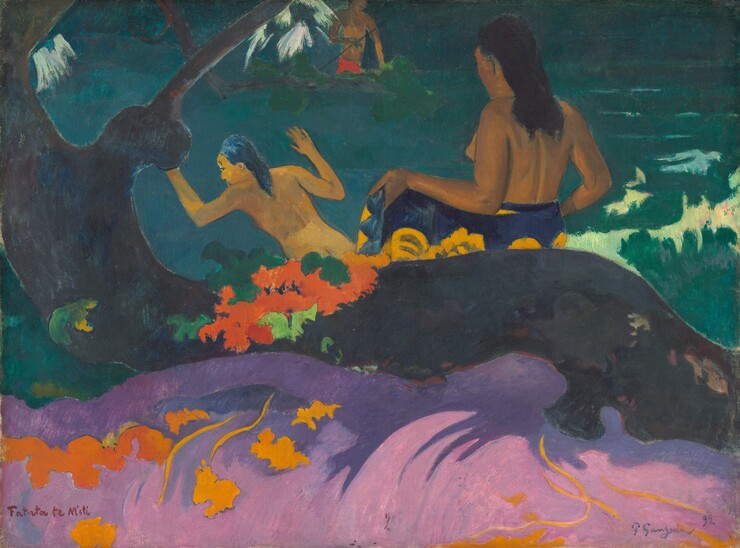 Two nude women with brown skin and long black hair stand with their backs to us at a riverbank in this stylized horizontal painting. The body of the woman to our left is angled to our left with her hands raised, presumably about to plunge into the teal-colored water. The woman to our right unwraps a cloth patterned with bright yellow flowers on a deep purple background from her waist. Between the women and farther away, a bare-chested man, also with brown skin, wears a tomato-red garment across his hips as he stands hip-deep in the water holding a long spear. The top of his head is cropped by the top edge of the painting. Along the left edge of the canvas, a gnarly tree is painted as a flat field of dark, charcoal gray and it rises off the side and top of the composition. An area of the same color, perhaps a thick root or the trunk growing nearly horizontally, spans the width of the painting, separating the women from us. The area around the trunk to our left and right is painted with fields of evergreen and cool mint. Closer to us, along the front of the root, a field of rosy pink swirls with grape purple to suggest sand. This area is dotted with harvest-yellow and pumpkin-orange vines and stylized flowers. A bunch of traffic-cone orange flowers with pine and spring green leaves sits on the root near the trunk, to our left. Most of the painting, especially the landscape, is painted with areas of mostly flat color. In the bottom left corner, the artist has written the title of the painting in blood red paint: “Fatata te Miki.” In the lower right corner, he signed and dated the work with periwinkle blue paint: “P. Gauguin 92.”