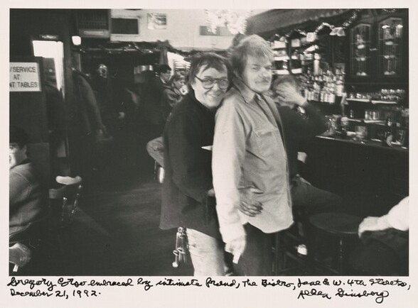 Gregory Corso embraced by intimate friend, The Bistro, Jane & W. 4th Street, December 21, 1992.