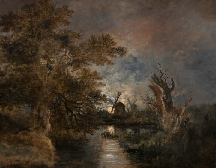 Two windmills are backlit by silvery moonlight along the horizon of this loosely painted, horizontal landscape. The horizon comes about a third of the way up the composition. The left half of the painting is nearly filled with a towering tree with muted olive-green leaves and a tan trunk. Some dark branches dip toward the river that runs from the bottom center of the painting into the distance, in front of the windmills. Light shimmers on the gently rippling surface, which is lined to our right with grassy vegetation. A hollowed out, gnarled, broken tree trunk twists against the sky from the riverbank to our right. The windmills are in the near distance, facing off to our left. Their sails create Xs against the screen of pearly white clouds floating against a muted blue sky.