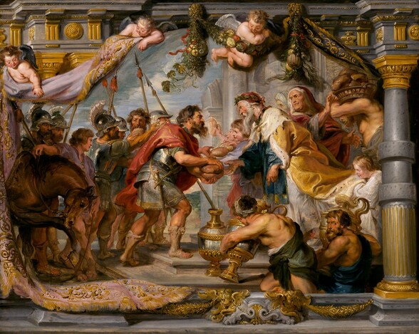 This horizontal painting shows a tapestry being unfurled and held up by winged, baby-like putti against a structure with gray and gold columns, seen at the edges of the composition. Taking up most of the composition, the tapestry shows two ranks of men, women, and children gathered behind two central men, who meet at the center. All the people have light or tanned skin, and the bodies we can see are muscular. In the central pair of men, the one to our left, Abraham, faces our right in profile as he holds two loaves of bread. He has a brown beard and short, wavy hair, and dark brows over a prominent nose. He looks at the other man with dark eyes and leans toward him, to our right. Abraham wears an armored breastplate over silver chainmail edged with gold, which falls to mid-thigh. A crimson-red cape wraps around his shoulders and swirls around his back. A sword hangs by his hip, and tan sandals cover his heels and shins. Behind him are seven men and one brown horse, who gnaws at its foreleg. Most of the men are bearded and five wear armored helmets. A cleanshaven man wearing a lavender-purple tunic stands with his arm slung over the horse’s neck, holding the rein between thumb and forefinger. The man to our right, Melchizedek has a long white beard and short white hair. His red cap is encircled with a wreath of dark green leaves. He wears a long-sleeved, waist-length, aquamarine-blue garment over a white skirt. A heavy, golden-yellow cape with a broad, white fur collar and lining drapes over his shoulders, and is supported by at least one attendant. Behind and around Melchizedek are eight men, women, and children, standing near stone, gray ruins. Behind Melchizedek, one portly person wearing a dark pink mantle reaches into a basket of bread held across the shoulders of a blond, bearded, bare-chested man. Closer to us, in the lower right corner of the tapestry, one man wearing a green toga and another wearing blue kneel and sit, holding oversized silver and gold urns, the size of their torsos. The man in blue, to our right, turns to look at us over his shoulder. A third large urn sits near the other man. A view into the landscape with a low, green hill and a pale blue sky is glimpsed between the groups. The tapestry showing this scene curls over at the edges where the pudgy angels lift the top edge. The top right corner of the tapestry wraps around the edge of an unseen feature of the building, next to a gray column that rises the height of the painting up along the right edge. The border of the tapestry is rose pink with stylized gold designs. One putto with brown hair holds up the left corner, and one with light gray hair holds up the middle one arm slung over the front of the tapestry. The third putto, with blond hair, hooks an arm over a leafy garland with fruit that hangs from the cornice near the top center of the composition.