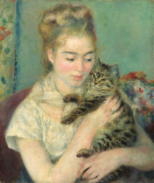 Shown from about the waist up, a young woman wearing white sits in an armchair cuddling a brown and black striped cat in this vertical painting. The wall behind her is seafoam green and the edge of a yellow floral curtain lines the left edge of the canvas. The woman’s body is angled to our right and she looks at the cat with dark eyes. The woman’s light brown hair is pulled up and her pale skin is accentuated by rosy cheeks. Her bare arms enfold the cat, held upright against the left side of her body so its head rests against her cheek. She supports the cat’s upper body with her right hand, on which she wears an emerald ring. The cat’s lower body nestles into the crook of the woman’s left arm and its paws are extended. The white and blue tones of the woman’s short-sleeved dress and kerchief tied around her neck contrast against the muted burgundy color of the armchair behind her. To our right, behind the woman, vibrant, loose brushstrokes in red, orange, green, violet, and white evoke a floral arrangement.