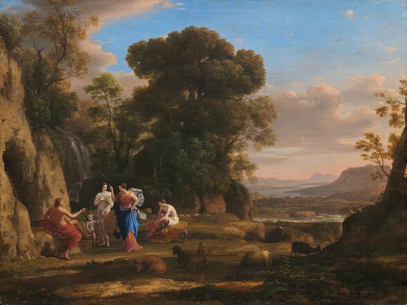 Three women, one man, and a winged child gather near a cave opening within a vast, distant landscape in this horizontal painting. The people are small in scale, taking up the lower left quadrant of the composition, and all have pale skin. Near the lower left corner, the man sits on a rock with his back mostly to us, so we see him in profile. Red cloth drapes around his hips and legs, and his chest and arms are bare. He braces a long staff in his far hand, and raises his right hand, closer to us, and points at the women. He is cleanshaven with a straight nose, closed lips, and brown, shoulder-length hair. To our right, two women stand and one sits on a cloth-covered rock. All three have brown hair that has been pulled back. They also have straight noses, and their lips are parted. The woman at the center of this trio wears a coral-red dress under lapis-blue cloth that drapes across her legs and is held in one hand. Smoke-blue fabric billows behind her. She stands with her body angled to our left, and she looks down at the man in profile. The back of one hand, to our right, rests near that hip, holding the fabric, and she points up with the index finger of her other hand. A peacock with its tail fanned open stands next to her, to our left. The other two women are nude except for a white cloth that partially covers the soft, rounded contours of their bodies. To our left of the peacock and close to it, the second woman holds her drapery so it covers her breasts and her groin. Her body faces us, and she turns her face to look at the central woman. A nude, winged child holding an arrow stands between her and the man. A blue ribbon across the child’s chest holds a quiver of arrows on his back. The third woman is to our right, sitting on a rock draped with a goldenrod-yellow cloth. A white cloth covers her hips, and she leans forward, touching her sandal. A long lance rests under the yellow cloth, and a metal helmet with a red feather sits next to the rock. Six sheep lie or graze along the grassy ground, closer to us. The rocky outcropping with the cave opening rises steeply along the left edge of the composition. A waterfall is tucked into shadows just beyond the cave, and tall trees enclose the left half of the scene. Nearly reaching the top of the canvas, the cluster of trees near the center have dark green canopies. A rocky bank is shown nearly in silhouette in the lower right corner, in front of a deep landscape with a body of water winding through low, marshy areas and a flat-topped formation. Mountains are hazy purple in the deep distance. The horizon comes about halfway up the composition, and the sky above has mauve-pink and lavender-gray clouds sweeping across a vivid blue sky.