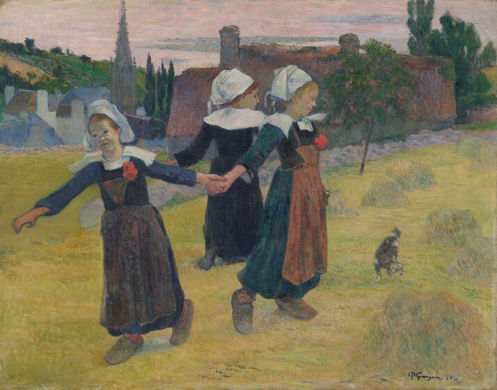 Three light-skinned girls hold hands to create a loose ring with their arms extended, in a grassy field in this horizontal painting. All three girls wear white headdresses, ankle-length, long-sleeved dresses, and clogs. Each dress has a wide white collar that extends beyond the shoulders. A ruby-red flower is pinned to the brown apron on the two girls whose fronts we see. Their features and clothing are outlined in cobalt blue and filled in with parallel, often visible strokes. To our left, a girl stands with both arms stretched out, one holding the hand of the girl next to her, to our right. The first girl looks off into the distance to our left with dark eyes. She has a button nose, and her peach-colored lips curve down at the corners. Her auburn-red hair is tucked back under her bonnet. Her dress is navy blue, and her stockings are brick red. She steps forward onto her right foot, to our left. The second girl, holding the first girls’ hand, stands facing our right in profile, looking slightly down. Her features are indistinct, but she also seems to have a snub nose and her pink lips are closed. She has blond hair and an emerald-green dress. Her hazelnut-brown stockings match her apron. She also steps forward, but onto her left foot. The third girl stands with her back to us, seen between the first two, as she looks over her shoulder to our right in profile. Her left arm is also raised but her right arm is hidden behind the second girl. The third girl has brown hair and a pointed nose. Her dress is black, and she steps forward onto her right foot. A small dog with brown and white speckled fur sniffs at the grass to our right of the girls. Piles of long grass or hay dot the lemon-lime green field, which dips down behind the girls and to our left to meet a low, stone gray wall. Buildings in plum purple, ivory white, terracotta orange, and ocean blue span the width of the painting beyond the wall. One narrow spire reaches above the other rooflines. Tall, narrow, dark green trees are interspersed among the buildings, and a hill climbs nearly to the top of the canvas to our left. A few thin slate-gray clouds float across a narrow band of shell-pink sky above. The artist signed and dated the work in lower right corner, “P. Gauguin 88.”