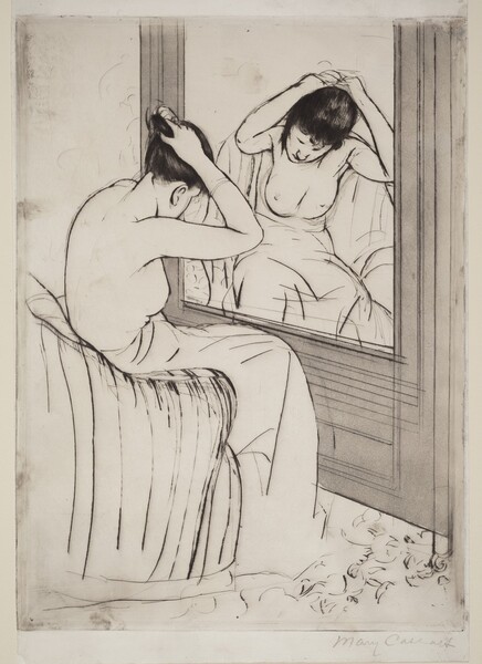 Nude from the waist up, a woman gathers her hair in her raised hands as she sits before a mirror in this vertical print. The large mirror is to our right, and the woman’s body is mostly turned away from us. Her head is bowed but a loose tendril of dark hair hanging beside one cheek is reflected in the mirror. Her lower body is wrapped in a voluminous cloth as she leans forward on a curved, upholstered armchair. Her facial features, the contours of her body, and the folds of the towel are all delineated with thin black strokes. The mirror is set into a light gray wall in front of the woman but the wall to our left, past her shoulders, is blank. A few inscribed lines suggest a floral pattern on the floor beneath her bare feet. The artist signed the work in graphite under the lower right corner, “Mary Cassatt.”