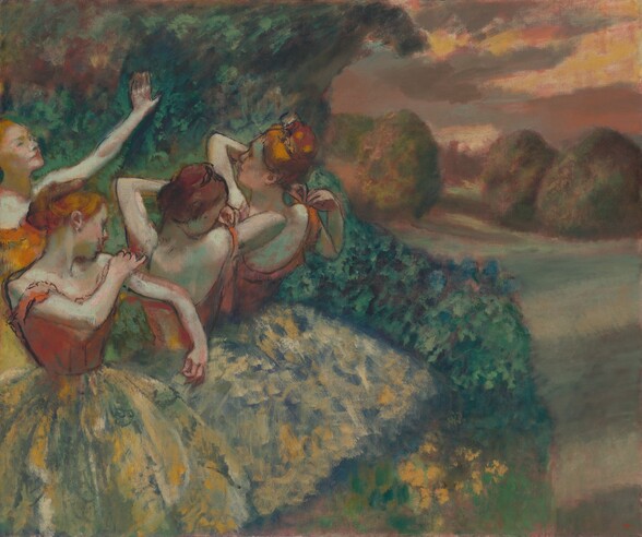 Four light-skinned ballerinas with russet orange hair tied back in buns adjust the straps of their bodices as they gather close together, their bodies and wide, knee-length tutus taking up the left half of this horizontal painting. The background or backdrop beyond them shows a grove of deep green trees to our left and a sunset view of meadows leading back to trees to our right. Three of the dancers stand in a row that extends from the lower left corner to our right and away from us. All three wear rust-orange bodices over tutus that are painted loosely with flecks of pale celery green and buttercup yellow against a muted royal blue background. Their bodices and upper bodies are outlined with black. The woman closest to us stands with her body angled to our right. Her face turns away as she looks toward and adjusts her left shoulder strap. The two dancers farther from us stand with their backs toward us, their bodies angled away from us to our left. The middle dancer looks back over her right shoulder as she lifts the opposite elbow to adjust that strap. The third dancer in the row holds both hands to her right strap as she looks off into the distance, to our left. The fourth ballerina, to our far left beyond this trio, stands with the arm we can see, her left, lifted with her hand held high as she looks off to our right. Her bodice is a brighter carrot orange, and is more loosely painted. The green foliage behind the dancers extends off the top edge of the painting. The pale sage green field to the right stretches before puffy, rounded trees daubed with mauve pink highlights. The coral-pink and golden yellow sky is streaked with lavender-gray clouds. The artist signed his name in scarlet-red paint with tiny, almost illegible letters in the lower right corner, “Degas.”