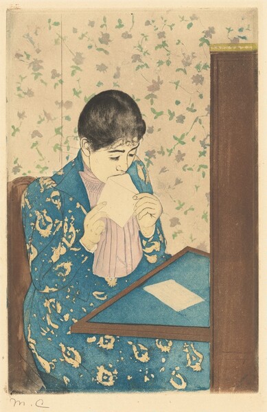 We look slightly down onto a young woman sitting at a writing desk as she licks an envelope in this vertical, color print. A table folds down or extends from a tall secretary desk to our right. The blotter on the table and the woman’s long dress are both royal blue. The dress has a vaguely floral pattern in the cream-white of the paper, and the jacket is open to reveal a vertically pleated, pale pink shirt beneath. The woman’s skin is also the color of the paper. Her black hair is pulled back over dark brows and a delicate nose. She holds the open flap of the envelope to her mouth with both hands. A piece of white paper lies on the desktop in front of her. She sits in a brown chair, and the wallpaper of the room is patterned with green leaves and muted pink flowers against a white background. The artist signed the work with her initials in graphite in the bottom left, “MC.”