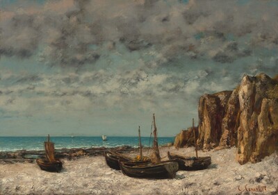 Four boats with low masts sit on a sandy beach next to rocky cliffs under a cloud-filled sky in this horizontal landscape painting. Three of the boats are clustered together near the center of the composition. The fourth is a short distance away to our left. The beach is painted with visible dabs and strokes of tan and cream white with gray shadows. The vertical cliffs are not much taller than the boats' masts and are painted in with smears and smudges of warm brown and black. The beach is dark with shoals where it meets the water beyond the boats. Two sailboats with white sails are on the water in the distance. Bands of parchment white, gray, and smoky lavender purple gather in the icy blue sky above the horizon, which comes about a quarter of the way up the composition. The artist signed the work in rust-red letters in the lower right corner, “G. Courbet.”