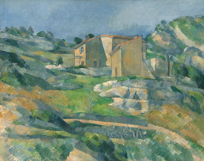 Pale beige, angular houses cluster at the center of the horizontal landscape painting. The hilly, rocky landscape around and below the houses is painted with cool blues and greens, and warm ivory and caramel brown beneath a pale blue sky. The artist applied the paint with regular, parallel, straight strokes.