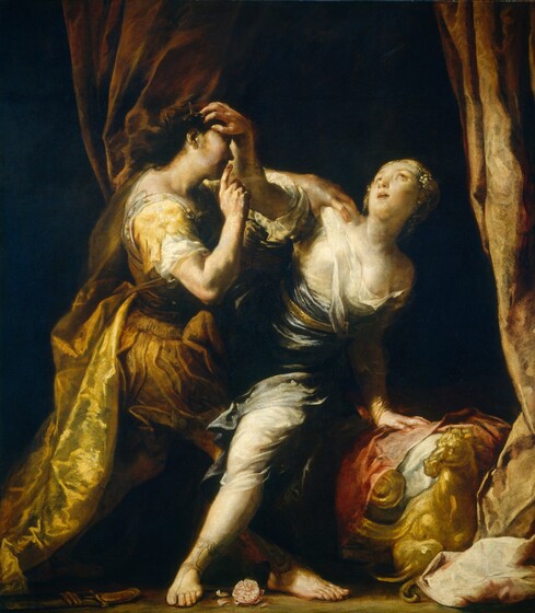 A woman struggles against a man who grips her shoulder to push her back onto a canopied bed in this vertical painting. Both people have pale skin. Bright light coming from our left illuminates the pair and the bed, while the area beyond is in deep shadow, creating a black background. To our left, the man faces the woman so we see him in profile facing our right, though much of his face is in shadow. He wears a silver breastplate over a white and gold tunic, which has a lion’s face on the sleeve facing us. His thin, gold crown blends into his chestnut-brown hair and a golden-yellow cape slips off his shoulders. He raises his right index finger to his lips as he thrusts his right leg between the woman’s legs, as if striding toward her. The woman’s torso twists away from the man, toward us, and she braces her left hand, to our right, against the bed. She stretches her other arm up to the man’s forehead, her fingers grasping at his hair and coronet. Her face and honey-brown eyes turn up, and her pale pink lips are parted. Her slate-blue gown is torn at the neckline, exposing part of her left breast. Her blond hair is pulled back behind her neck, and dots of pale yellow suggest flower petals or jewels around her temples. The twisting, copper-brown curtains of the bed frame the scene and pool around a gilded, carved horse that decorates the corner of the bedstead, in the lower right corner of the painting. A partly unsheathed sword and a white flower with torn petals lie on the floor near the sandaled feet of the man and woman.