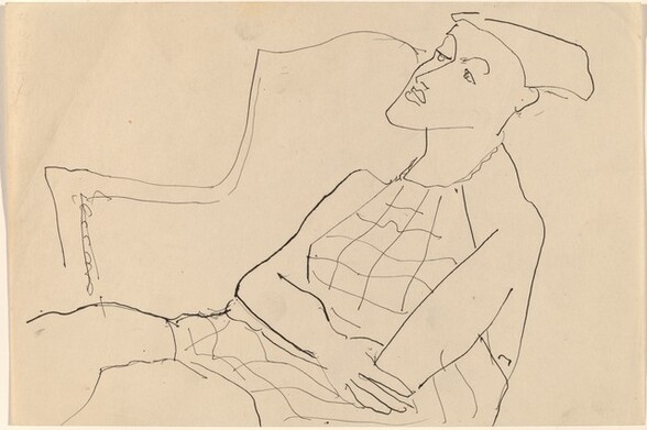 Seated Woman Wearing Checked Top
