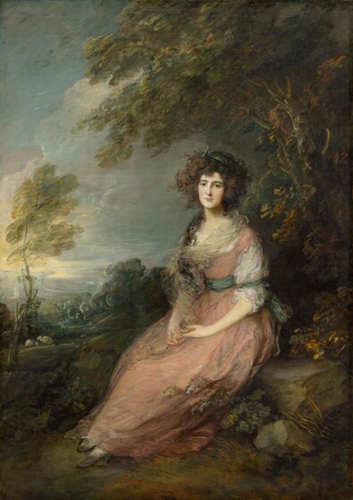 A fair-skinned woman wearing a long, rose-pink gown sits amid a lush landscape in this vertical portrait painting. The woman’s body is angled to our left, but she turns her head to look at us with green eyes under dark brows. She has a long, straight nose, smooth, flushed cheeks, and her carnation-pink lips are closed. Her long, curly, ash-brown hair is loosely pulled back in an emerald-green ribbon, but tendrils floating around her face seem to lift as in a breeze. A ponytail or thick tendril drapes over her far shoulder, almost reaching her waist. The low neckline of her gown is wrapped with translucent, gold cloth, perhaps tulle, and the elbow-length sleeves are gauzy white. The gown has a pale, rose-pink bodice and long, full skirt. Ribbons the same green as the one in her hair wrap around her waist and around the elbow we can see. She crosses her ankles so delicate, high-heeled, charcoal-gray slippers peek out from the bottom hem of her skirt. She sits on a gray boulder, her hands folded in her lap as she holds the ends of her translucent scarf. A tall tree grows along the right edge of the composition to arc up and over her with olive-green and harvest-gold leaves. Beyond the woman, the land dips down to our left back into a tree-filled valley. Swipes of slate-blue in the distance could be mountains. A short distance from us, to our left, one tree with a narrow, pale green canopy grows up against the sky. Behind that tree, yellow sunlight breaks through pale blue, lavender purple, and silver clouds that fill the rest of the sky. Parts of the scene are loosely painted with swirling, fluttering strokes, especially in the woman’s costume and the trees around her.
