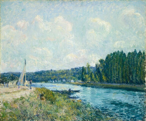 A wide river cuts through a loosely painted, sunlit landscape in this almost square painting. Short strokes of baby and sea blue with touches of white create ripples on the surface on the river, which runs from the lower right corner to the left edge of the canvas. The horizon comes about a third of the way up the composition and is lined with low hills painted in tones of cobalt blue and grass green. We are on or slightly over the left bank of the river, which is painted in strokes of pale peach, pink, and green. A white path running along the top of the bank curves away from us. People, painted with loose strokes of topaz and navy blue, walk on the path, and a few touches of gray, tan, and emerald green suggest a woman and child sitting in the grassy bank, near the water. A lavender-blue sail rises just beyond the far curve of the path, and two narrow dark blue objects jut into the water nearby, presumably long rowboats. The far bank is lined with a dense cluster of tall, spear-like, blue-green trees reaching high into a powder-blue sky, which is filled with swirling, thin puffs of white clouds. Some light blue smudges at the river’s edge in the distance suggest low buildings. The artist signed the lower left, “Sisley.”