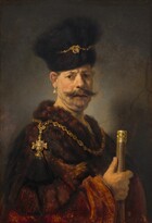Shown from about the waist up, a light-skinned man with sagging jowls and a double chin wears a fur garment and hat, a large teardrop pearl earring, and gold chains, and he holds a gold-headed cane in this vertical portrait. In front of a cracked gray stone wall, the man stands with his body angled to our right but he turns to look at or towards us with brown eyes under a furrowed brow. He has a bulbous nose and his lips are slightly parted under a wide, wispy mustache. His brown hair is mostly hidden under the tall dark brown fur hat, which is wrapped with a gold chain with a gold medallion at the front. The chestnut brown fur coat looks especially fuzzy along the neckline, which is also encircled with a thick gold chain. A gold crown-shaped pendant with a black brush hangs over his right shoulder, closer to us. He holds a gold-tipped cane with his right hand, his thumb extended along the cane. 
