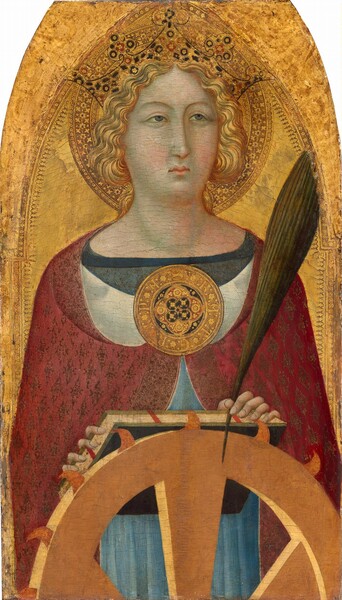 Shown from the waist up, a woman wearing a garnet-red robe rests a book and a palm frond against a spiked wheel, all against a gold background in this arched, vertical painting. The woman’s light skin is tinged with pale green, and her cheeks are faint pink. Her shoulders face us, and she slightly looks up and off to our right with gray eyes under curved brows. She has a long, straight nose, and her small, full, bow-shaped lips are closed. Her wavy blond hair is parted down the middle and pulled back at the base of her head. Her red robe has a pattern of delicate diamond shapes and the underside is white, visible where it turns over around the neck. The robe is fastened with a round, gold disk the size of a DVD. Letters there read, “S.K.A.T.E.R.I.N.A.” around the perimeter of a four-lobed, red, blue, and gold geometric design at the center of the brooch. The sky-blue garment beneath her robe has a marine-blue collar. She clasps the palm frond in her left hand, to our right. The hand rests on the book, which is propped against the wheel in front of her, so the frond reaches beyond and above that shoulder, nearly to the edge of the painting. The wheel is edged with short, curving spikes like talons. The woman’s gold crown and round halo blend into the shimmering gold background, which is visibly cracked in some areas. The top of the panel curves up as if into an arch but is cut across the panel over her halo.