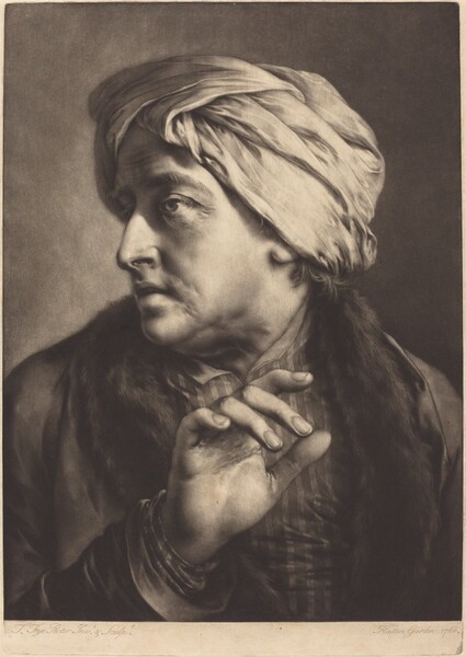 A Man with a Turban and Striped Shirt