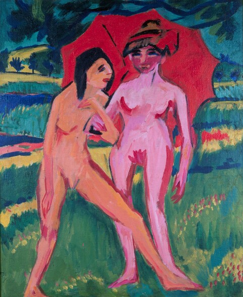 Two nude women, painted in vibrant coral peach and bubblegum pink, stand under a red umbrella in a landscape in this stylized, vertical painting. The scene is painted with areas of flat or streaked color with visible brushstrokes throughout. The women and umbrella take up most of the picture. The woman on our left stands facing our right almost in profile. Her skin is vivid peach. Slashes of red outline her breasts, groin, and legs. Her hair, eyes, and eyebrows are painted with black strokes. She stands on one leg and stretches the other in front of her to overlap the far foot of the other woman. The first woman hooks her arm through the elbow of the other, who stands facing us to our right. This second woman has vivid pink skin also outlined in red. Her face is a darker shade of pink, resembling a mask, and her eyes are parallel strokes of black and blue. Her left arm, on our right, hangs by her side, and she holds the umbrella with the other arm. She either wears a hat or her hair is painted with alternating bands of black, red, and brown, and there is a red flower or bow to one side. Black lines in the candy-red umbrella suggest a rib on the underside and the handle. Cobalt-blue branches of a tree above the women has blue and green leaves. The landscape beyond them is made up of bands of acid green, yellow, saturated blue, and cool green.