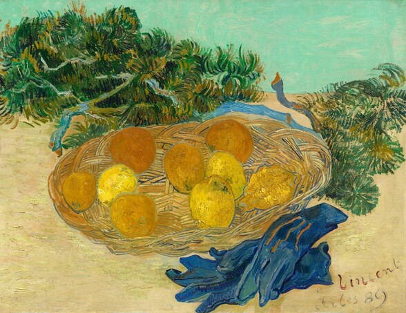 Nine oranges and lemons sit in a shallow basket with dark green, spiky branches behind and a pair of cobalt-blue gloves in front in this horizontal still life painting. The scene is painted with long, loose brushstrokes, which are visible throughout. The muted orange and golden yellow fruit are outlined with blue, as is the woven basket in which they sit. The two cypress branches behind and to either side of the basket are painted with sky blue along the stems and long, bristly needles. The gloves sit one atop the other near the lower right corner, and the top glove has three brown stripes down the back. The surface beneath the still life is sand brown, and the pale turquoise background takes up the top third of the composition. The artist signed and dated this with the location in the lower right corner, “Vincent Arles 89.”