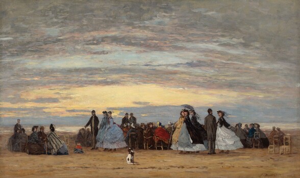 About three dozen men and women sit, stand, or stroll along a sandy beach beneath a sunset-streaked sky in this horizontal landscape painting. The people are small in scale within the landscape, taking up about a quarter of the canvas's height. The scene is loosely painted so many of the facial features are indistinct, but the faces we can see have pale or olive-toned skin. The area closest to us is a strip of sand, and, a short distance away, a brown and white dog sits facing away from us to our left of center. The women all wear dresses with long sleeves, tight bodices, and ankle-length hoop skirts in shades of baby blue, smoke gray, butter yellow, chocolate brown, crimson red, black, or white. Some wear jackets, capes, or shawls, and veils flutter off some of their hats and bonnets. The men wear suits with long tails and rounded hats. Most of the people sit in wooden chairs, and a few stand or walk along the beach. The walking women carrying long sticks or canes. Smudges of ruby red, slate blue, and a touch of straw yellow could be the form of a child crouching in the sand, to our left. Two ladderback chairs sit near the crowd to our right. The horizon comes less than a quarter of the way up the composition. Thin screens of pale gray clouds above are touched on the undersides with petal pink, and they break to show peeks of soft yellow along the horizon and topaz blue a bit higher up.