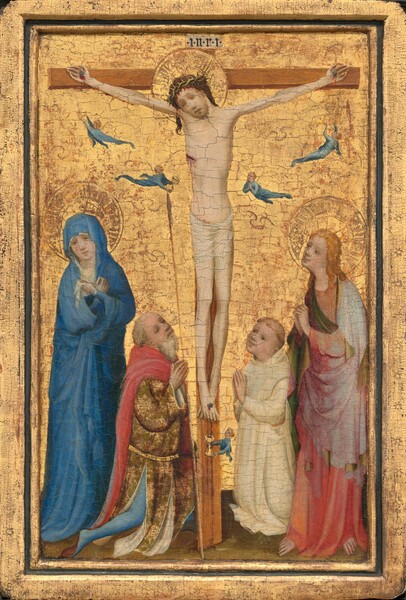 A mostly nude man hangs by his outstretched hands from a wooden cross, and is flanked by two pairs of people in this vertical painting. The cross and four people at its foot fill the composition. All the people have pale skin, and the scene is set in front of a shiny gold background. Blood trickles from a ring of thorns around the man’s head, over chestnut-brown hair. Eyes closed, his face tips to his right, our left, to rest on his shoulder, and his body faces us. His hips are wrapped in a translucent white cloth. Blood drips from the nails piercing his hands and overlapping feet on the T-shaped cross, and from a wound over his right ribs. His head is encircled with a flat, gold, disk-like halo. A plaque at the top of the cross, over his head, reads “INRI.” At the foot of the cross, to our left, a balding man with a long, white beard, wearing a gold brocade tunic under a red cape, kneels with his head tipped back and eyelids lowered. Behind him and to our left, a woman wearing a long lapis-blue robe that covers her head and body stands facing us with her hands crossed across her chest. She holds a piece of white cloth and has tears on her cheeks. She also has a gold halo. Another man kneels to our right of the cross. He wears a white robe and his hair is cut into a ring that encircles his head. He looks up at the cross. Along the right edge of the panel, a person with long blond hair surrounded by a halo stands with fingers interlaced in prayer, looking toward the cross. This person’s robe is rose pink lined with olive green, and it falls over a coral-pink garment beneath. Five tiny angels wearing royal-blue garments flit about, each catching the blood from the man’s hands, side, and feet in golden chalices. The fifth angel flits to our right, mirroring the angel catching blood from the gash on the opposite side. The angels’ wings were punched into the gold background, but are difficult to make out now. The surface of the panel is covered with a network of fine cracks, and some of the red layer under the gold shows through.