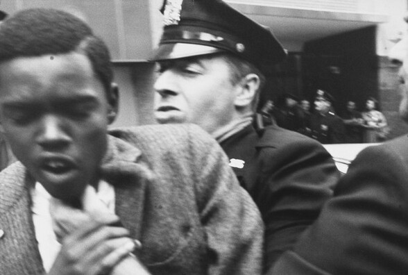 Black man being forced aside by police, New York City