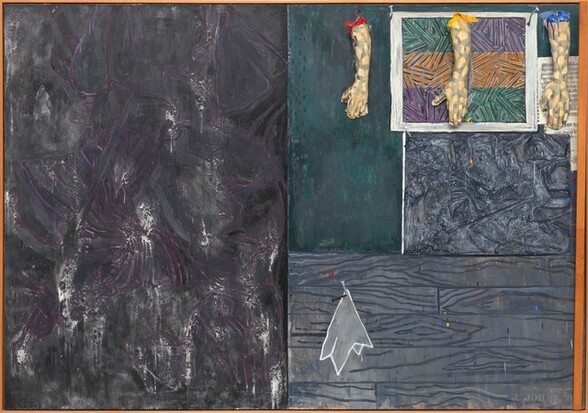 Three casts of human hands and forearms hang from the top edge of the right half of this horizontal abstract painting, which is divided vertically in two equal parts. The rectangular field to the left is mottled with steel and charcoal gray streaked with white and amethyst purple. The panel to the right is divided again so the top half is slightly larger than the bottom half. The bottom portion is painted with a pattern to resemble abstracted wood grain in nickel and slate gray. A stylized white cloth, perhaps a handkerchief, is painted to look as if hanging from a nail hammered into the wood paneling, to our left. The top portion seems to be layered with paintings and prints below and beneath the three arms. The three-dimensional arms hang from looped metal wires on metal hooks spaced along the top edge, coming about a quarter of the way down the overall composition. The peach-colored arms and hands are painted all over with irregular gray patches, creating a camouflage effect. They hang down so the open palms are flat against the canvas, the thumbs extended to our left. The top of the arm to our left is painted cherry red, the middle is painted canary yellow, and the right arm royal blue. The paint drips down the arms and splatters on the hands and on the faux wood panel below. Behind the hands, it appears that one of the artist’s prints hangs from two nails on the canvas, but this is also part of the painting. The illusionistic  print has three horizontal bands of pine green, pumpkin orange, and violet purple crisscrossed with black lines. Seeming to hang behind it and under the right-most arm is a sheet of music overlapping another piece of paper printed with the letters “OHN C” and “THE PERILOUS.” Below, and filling the space between the illusionistic print and the wood panel, is a rectangular field of abstract gray and black swirling forms. The entire canvas is surrounded by a thin, amber-colored wood frame. A narrow wooden slat is attached with a hinge on the inner surface of the frame at the bottom right corner, so the slat runs up along and rests against the canvas near the rightmost edge of the frame. The artist signed the work with stenciled letters in pale gray in the lower right corner: “J. JOHNS ‘8.”