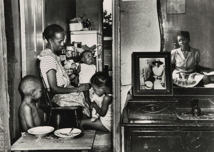 Gordon Parks, Washington, D.C. Mrs. Ella Watson, a government charwoman, with three grandchildren and her adopted daughter, July 1942, printed later