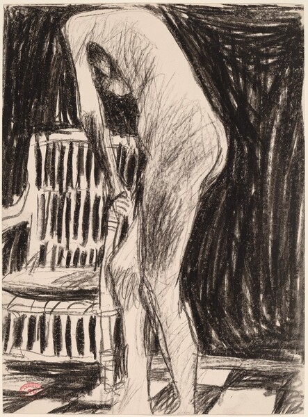 Untitled [standing female nude holding the arm of a chair]