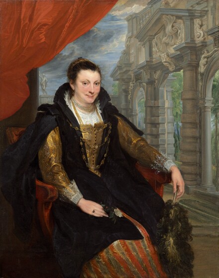 A woman with pale, peachy skin wearing elegant gold and ink-black garments sits in front of a stone portico in this vertical portrait painting. Her red armchair is angled to our right, but the woman turns to look at us under cocked brows. She has high, rosy cheekbones and a long straight nose. Her pink lips curve up in a smile framed by the faint suggestion of dimples. Her brown hair is pulled back under a gold band or net, and a gold earring hangs from the ear we see. Her gold dress has a fitted bodice with a line of buttons down the front and puffy, brocaded sleeves. She wears the bodice over a white chemise, which comes nearly to the double strand of pearls worn like a choker around her neck. Frothy white lace surges up to encircle the back of her neck, and more lace stretches back along her forearms from the cuffs of her gold dress. The black cloak she wears over the dress splits over the sleeves and flares up behind the neck, echoing the lace. A long gold chain weaves back and forth across the open front of the black cloak, which is patterned with black on black. The woman wears a ring on her right hand, which rests in her lap and holds a white flower. The cloak stops at the woman’s knees to reveal a gold and red striped skirt. The woman’s other hand, farther from us, rests along the arm of the chair and holds an ostrich' feather fan with a silver handle. A scarlet-red curtain in the upper left corner above the chair gives way to a view into a courtyard lined with a portico along the right side. The portico has three openings separated by wide, horizontally ribbed columns. Ornamental shells, creatures, and people are carved into the face of the portico, and bright green trees are just visible through the openings. Gray and white clouds sweep across a vivid blue sky around the woman’s head.