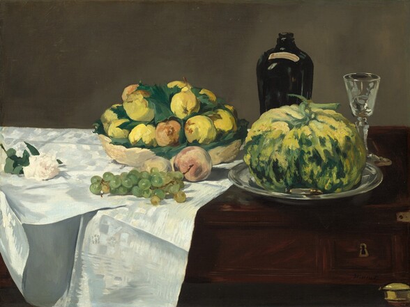 A white rose, grapes and other fruit, a squat gourd, a bottle, and a glass are arranged across a dark wood table partly covered by a white cloth in this horizontal still life painting. The table and its objects fill the width and most of the height of this composition, and are set against a sable-brown background. The rose, bowl, cluster of green grapes, and a peach sit on the shimmering, bright white cloth, which is draped over the left half of the table. The shallow, straw-yellow bowl holds a pile of canary-yellow pears and a few peaches nestled among green leaves. Another peach and a second piece of fruit sit in front of it, partly obscured by the grapes that lie near the front edge of the table. Continuing to the right, the pumpkin-shaped gourd, roughly the size of the bowl and its fruit, is painted with streaks and daubs of lemon yellow and light and forest green. It sits on a gleaming silver tray. A tapered, earth-brown bottle and a small glass with a long stem stand behind the gourd. On the front face of the table, near the lower right corner, a keyhole is outlined with gold, and the top of one table leg is also gold. The objects are loosely painted with some visible brushstrokes, especially in the fruit in the bowl and the gourd. The artist signed the lower right, Manet.